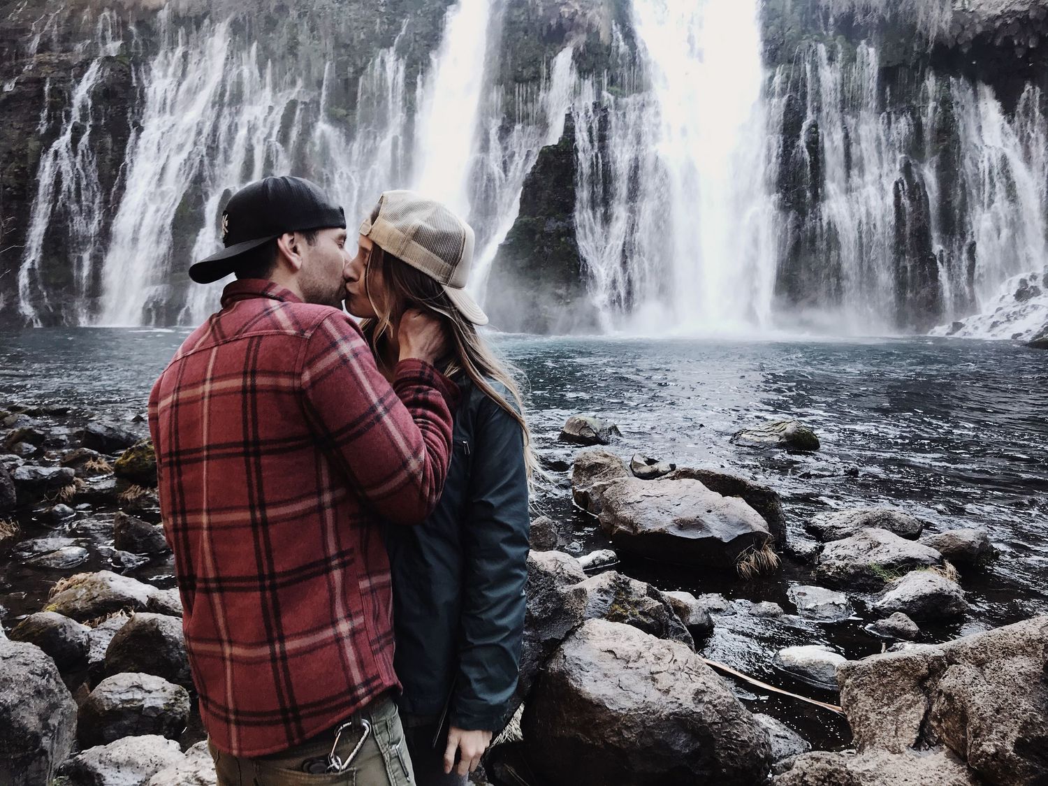 couple in love near waterfall Pacific Northwest and Lassen county