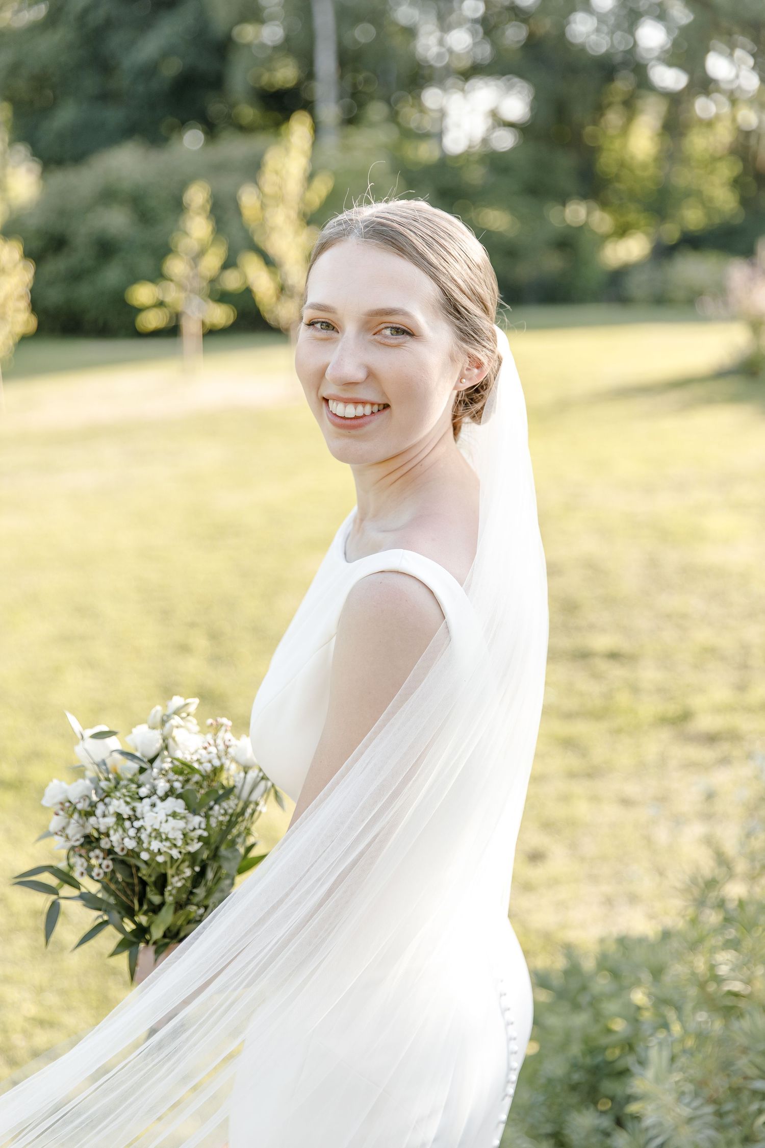 Bridal portrait outdoors English summer wedding