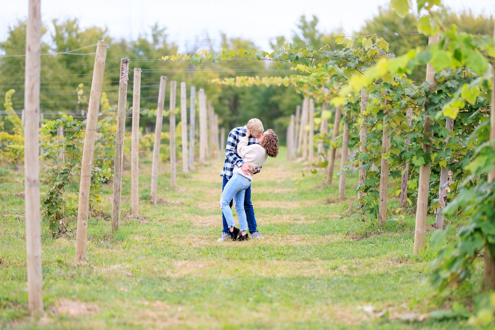 Couple Kissing During Engagement Photo Session at Ransom Sage Farm in Chardon, Ohio