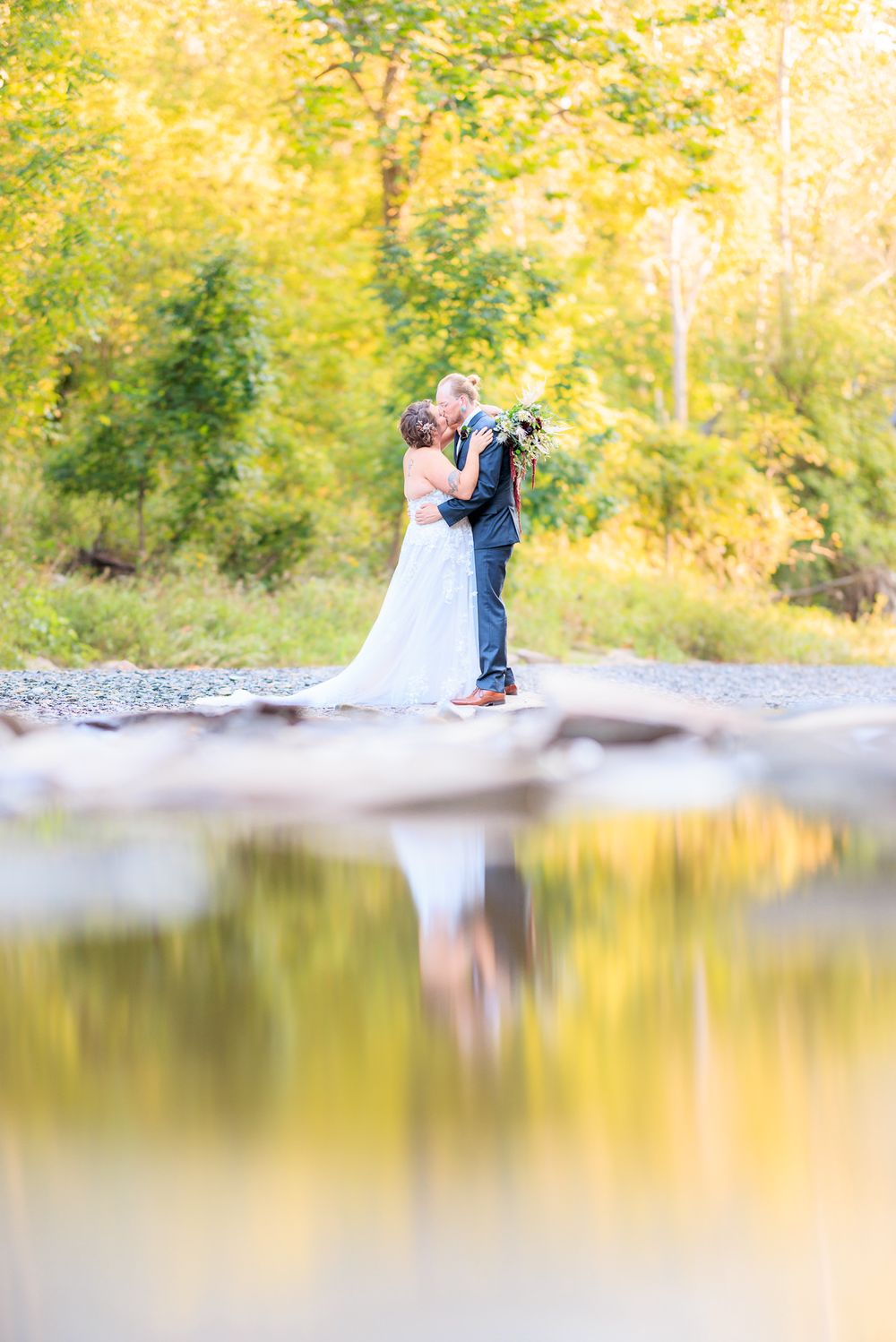 Wedding Portrait of Couple Kissing During Wedding at Hillcrest Orchard in Amherst, Ohio