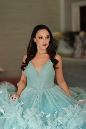 Elegant mint tulle ballgown with sweetheart neckline photographed in natural light.