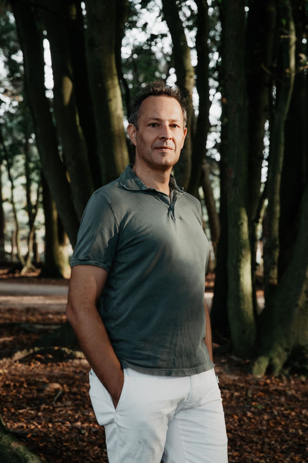 Profile head shot with nature backdrop
