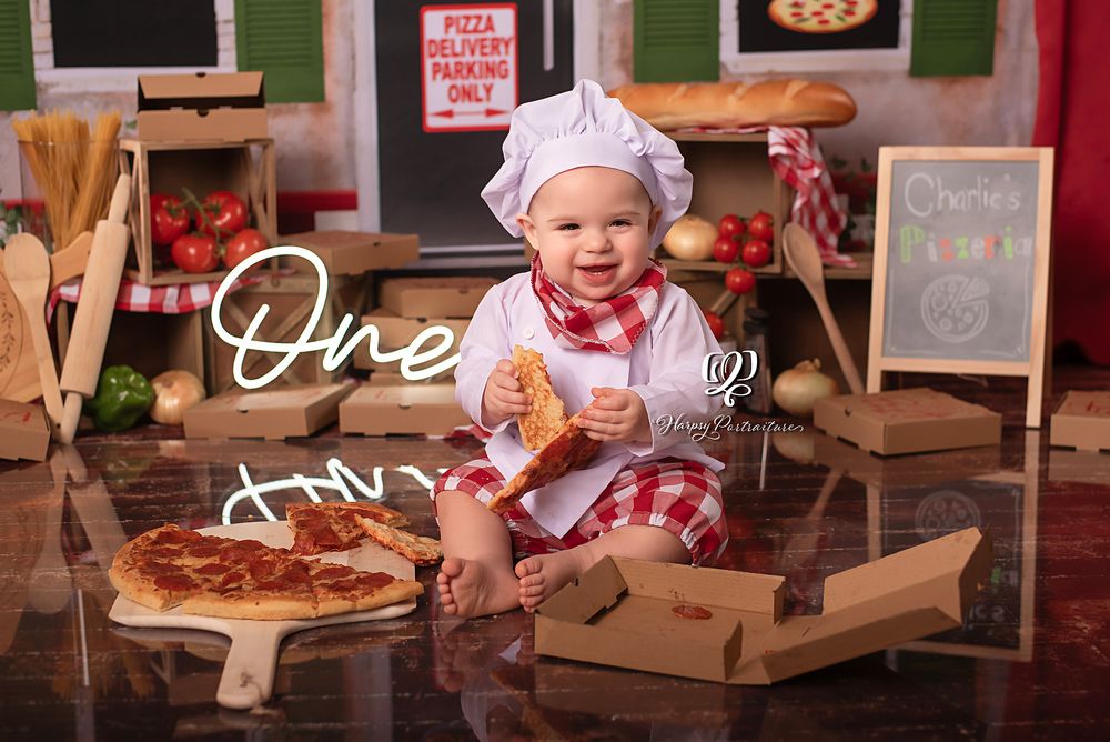 Pizza cake smash photoshoot birthday session; best photographer Lexington, SC; professional one-year birthday photoshoot; portrait studio