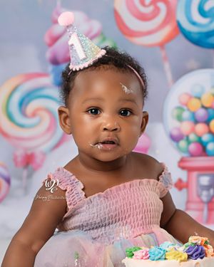 Baby girl wearing pastel dress and party hat with giant gumball machine & pastel birthday cake; pastel themed Cake Smash Session; SC photos
