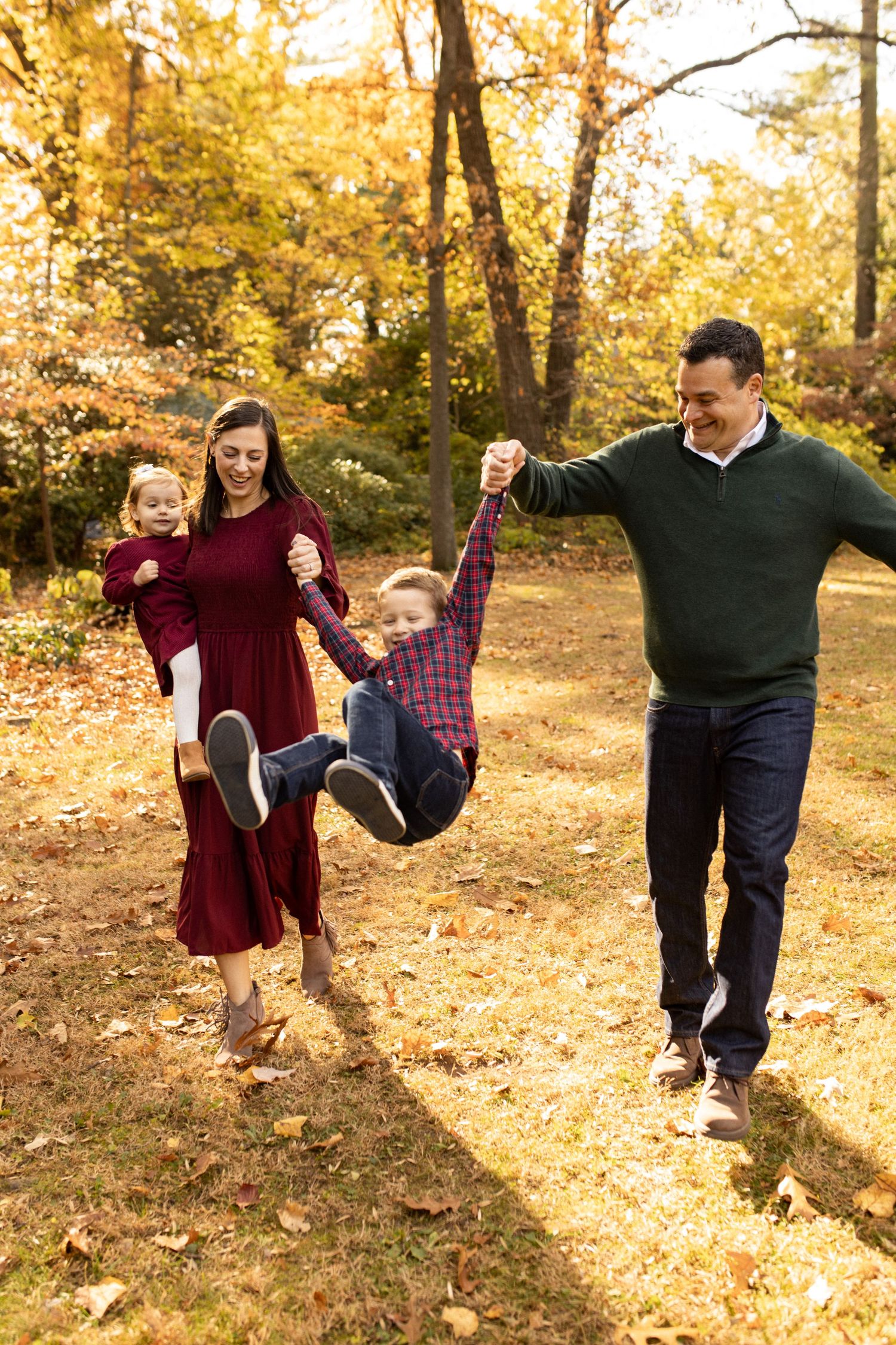 Maryland family taking a stroll during lifestyle session in Rockville, MD.