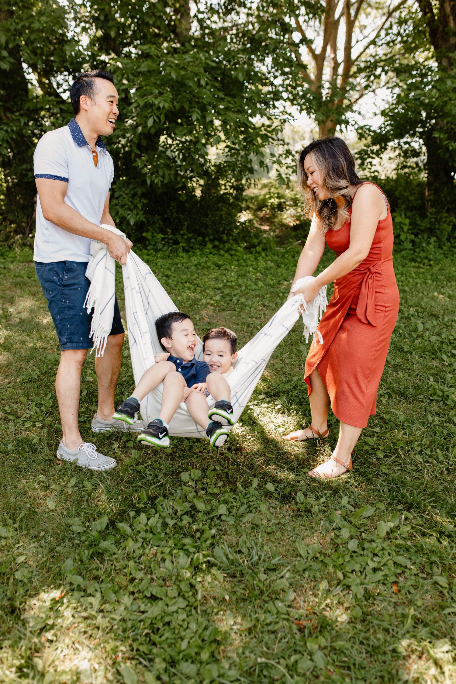 Maryland Family Lifestyle session swingin on a blanket at Seneca Creek Park, Gaithersburg MD.