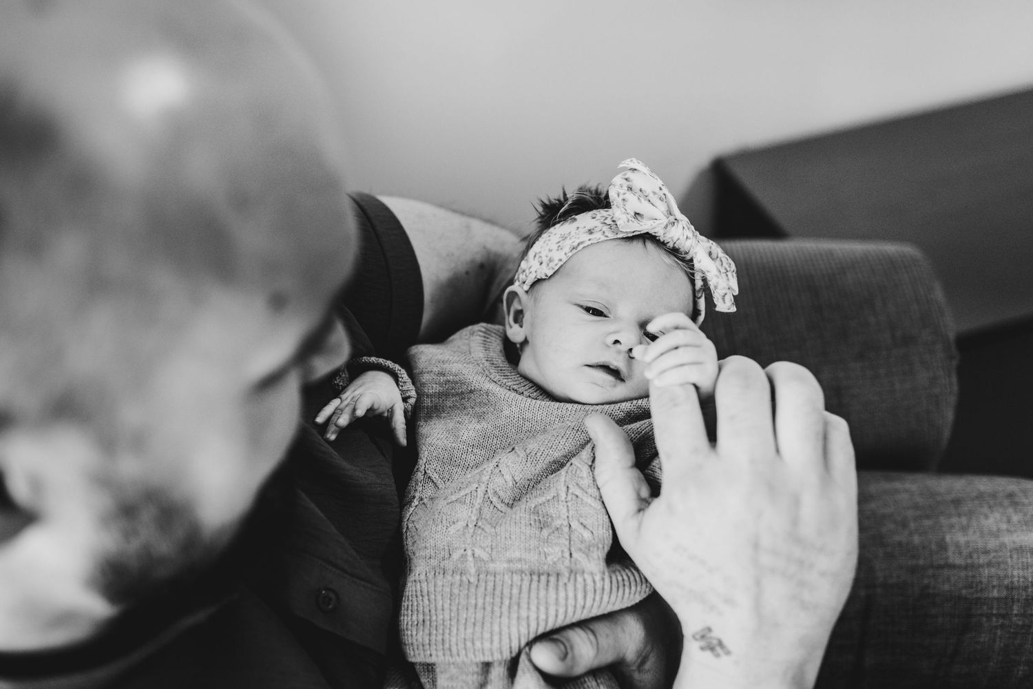 Black and white photo collage showing mother-child moments and parenting in a documentary lifestyle style.