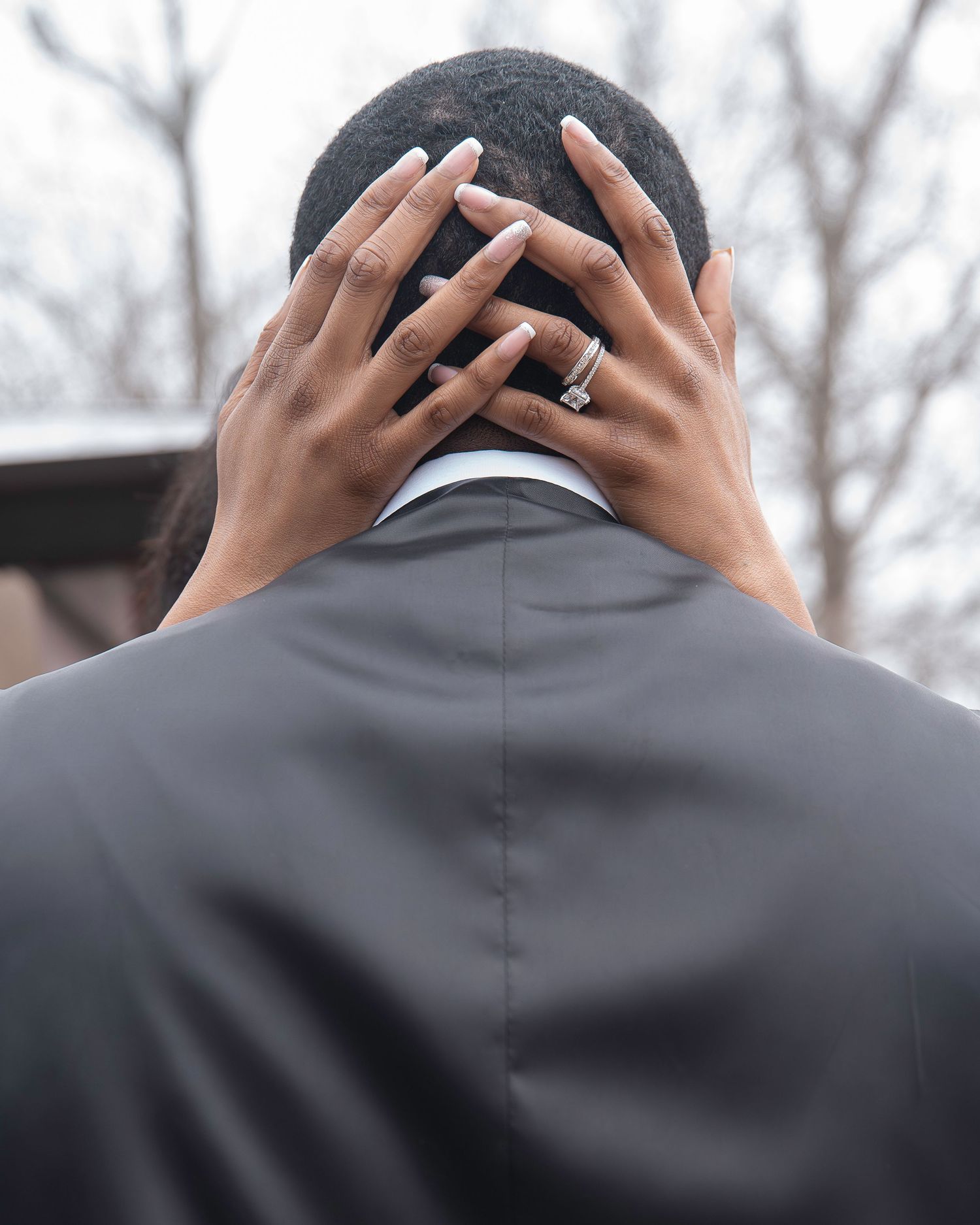 Back view of someone holding their head in frustration shown in a sequence of increasingly zoomed in photos.