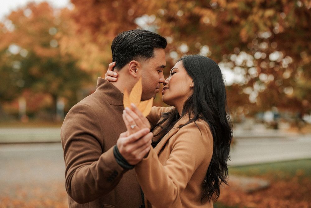 Engagement photo of a couple sharing a candid, emotional moment during a wedding photoshoot — natural light, authentic emotion, and beautifu