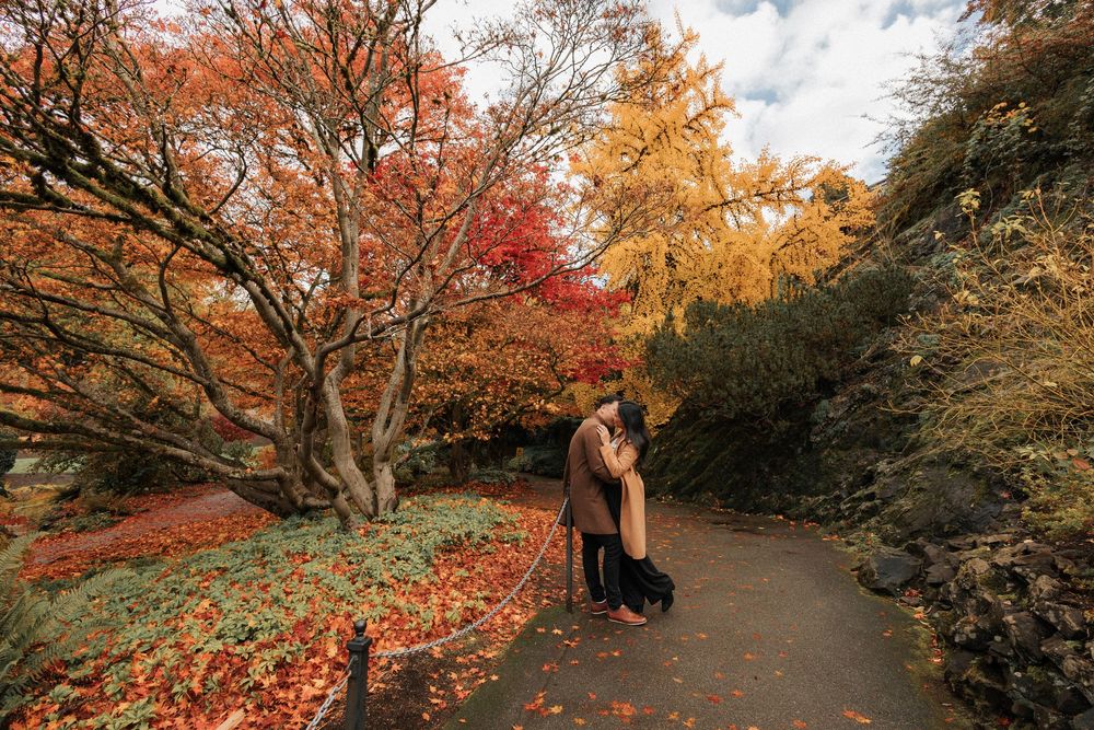 Engagement photo of a couple sharing a candid, emotional moment during a wedding photoshoot — natural light, authentic emotion, and beautifu