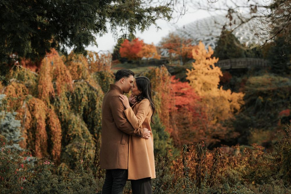 Engagement photo of a couple sharing a candid, emotional moment during a wedding photoshoot — natural light, authentic emotion, and beautifu