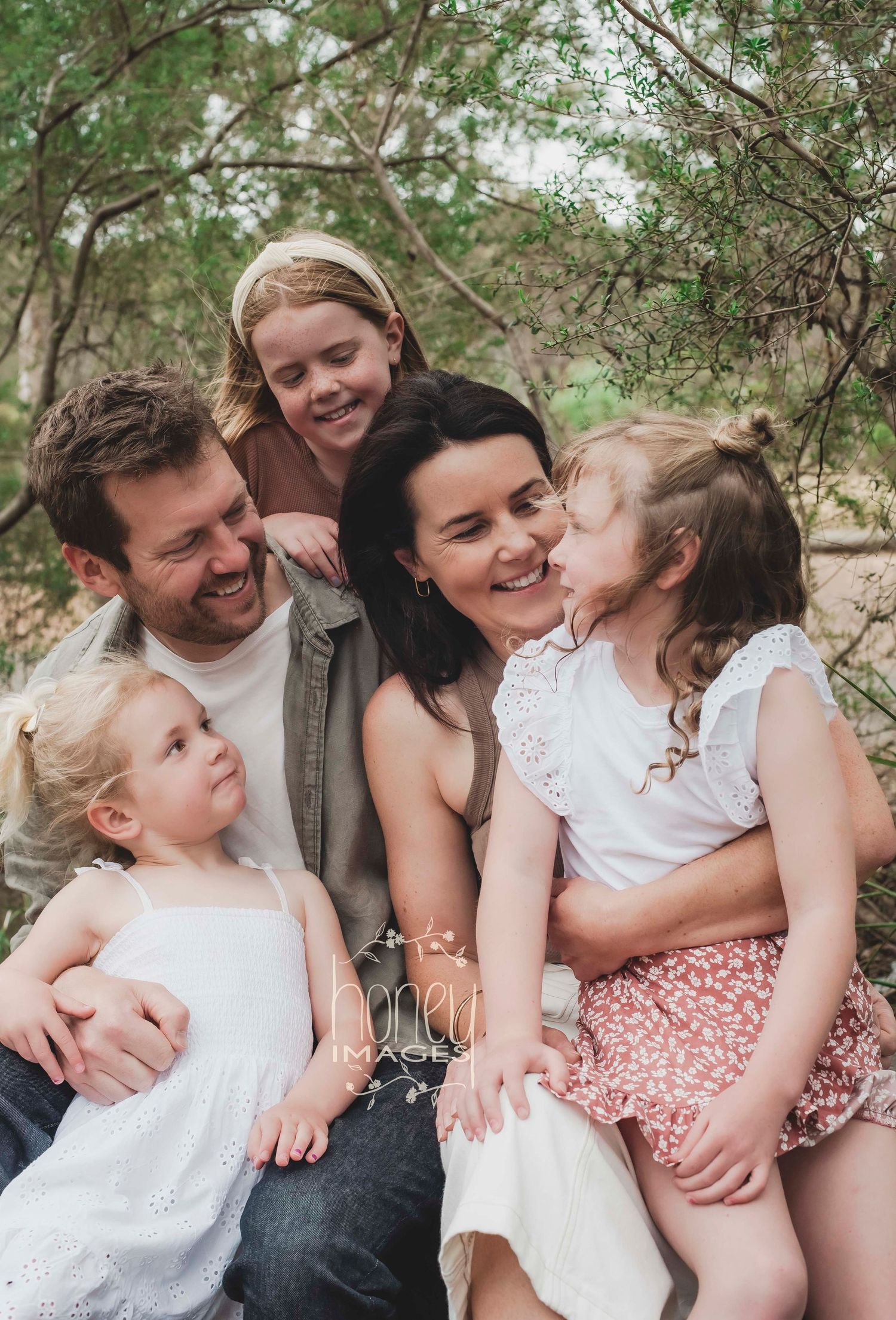 a family looking into each others eyes