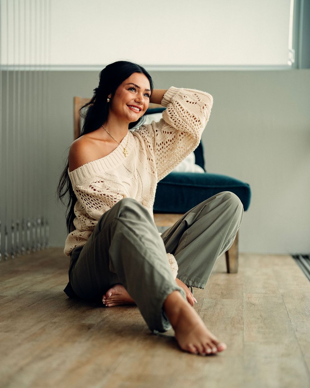 Collection of creative floor poses on hardwood flooring in soft natural window light.