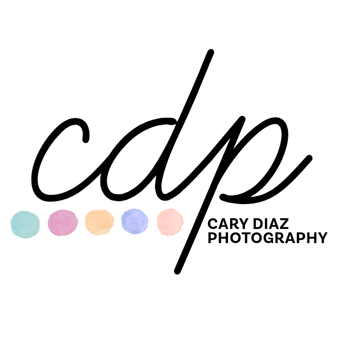A simple illustration of five pastel-colored dots arranged horizontally on a black background.