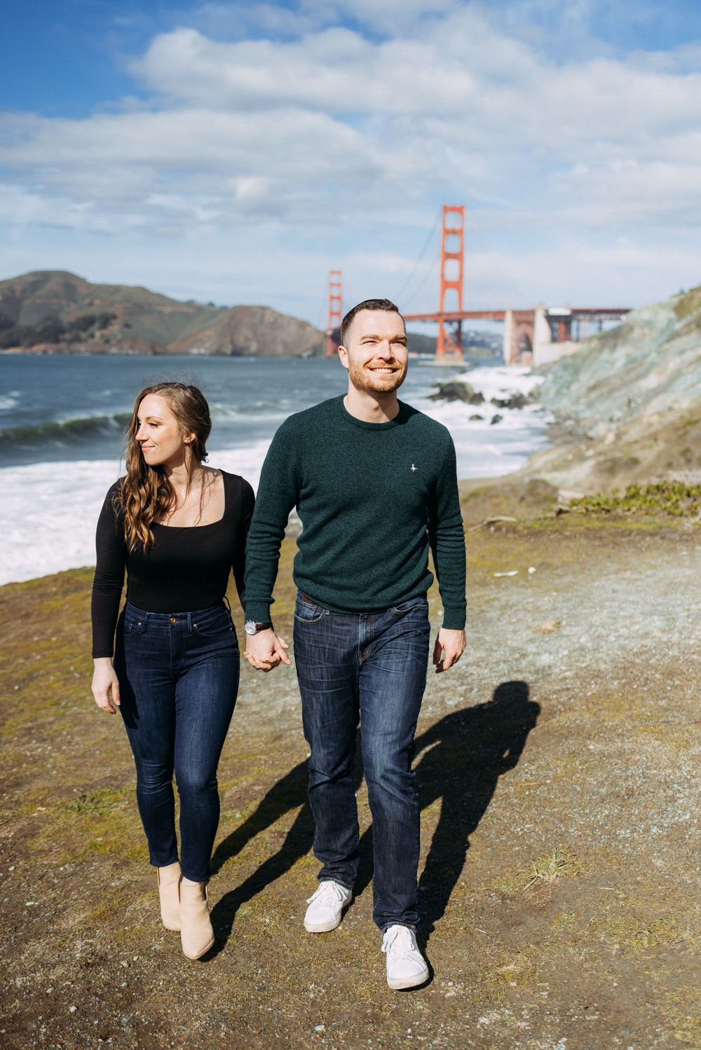 Walking engagement photo pose at popular San Francisco tourist spot