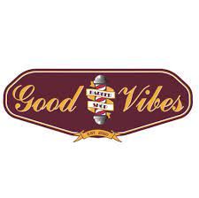 Vintage-style 'Good Vibes' text logo in burgundy and gold colors.