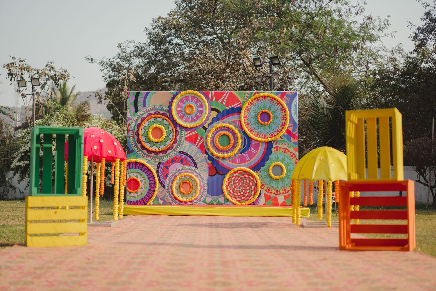 Vibrant Mexican-inspired decorative backdrop with colorful geometric patterns and designs.