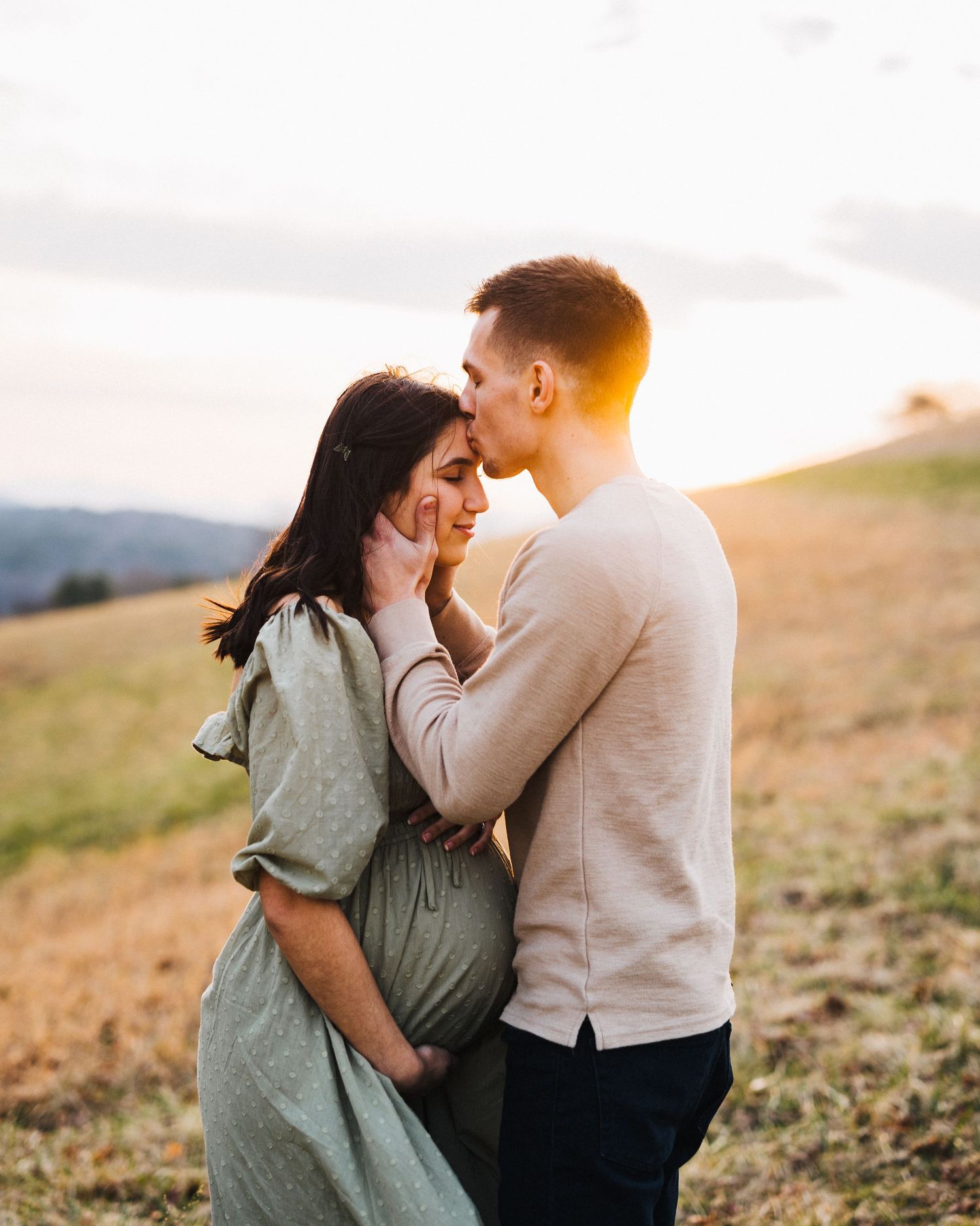 Asheville NC family Photographer with a couple on their maternity session
