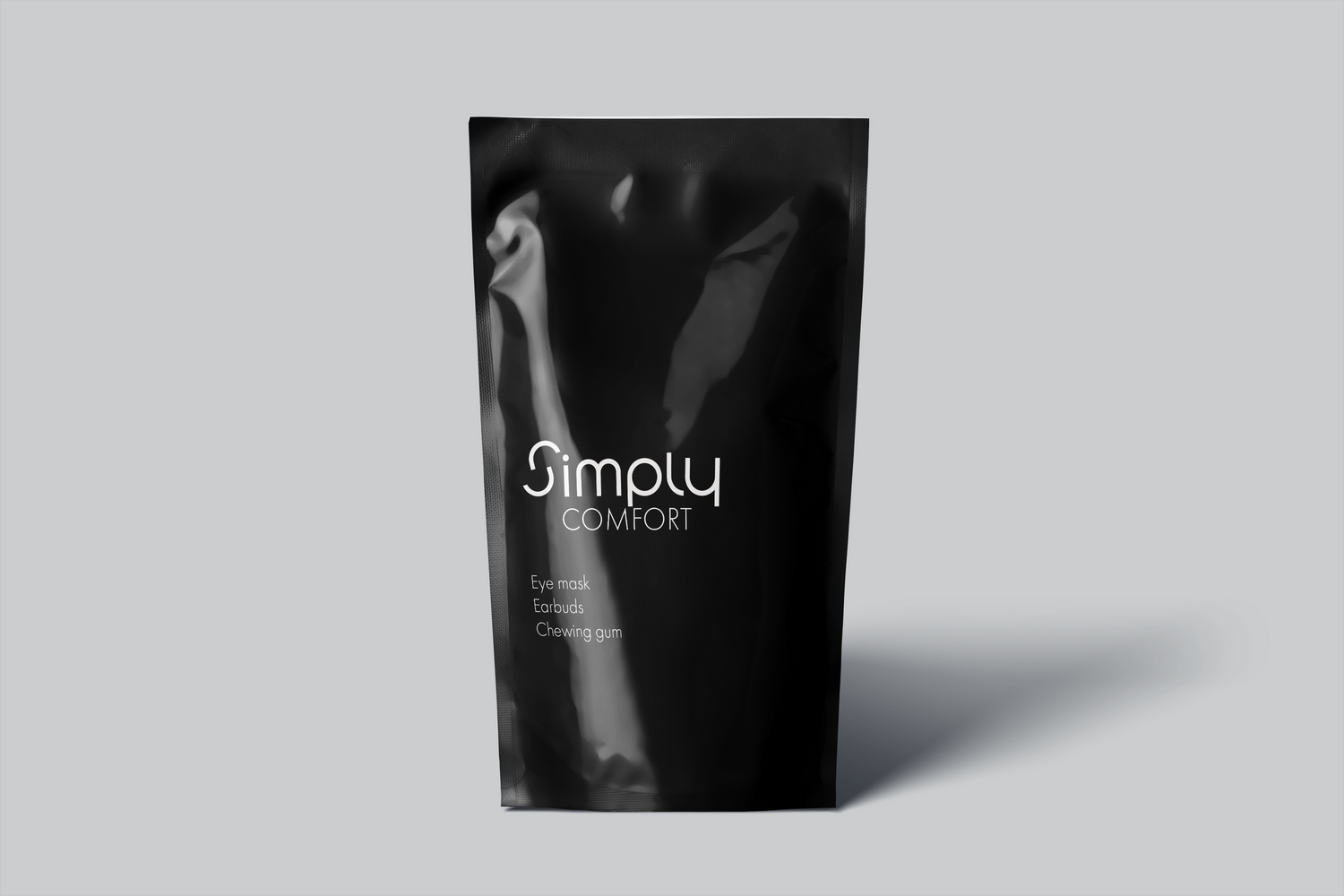 Black packaging design mockups displaying sleek product containers against light background.