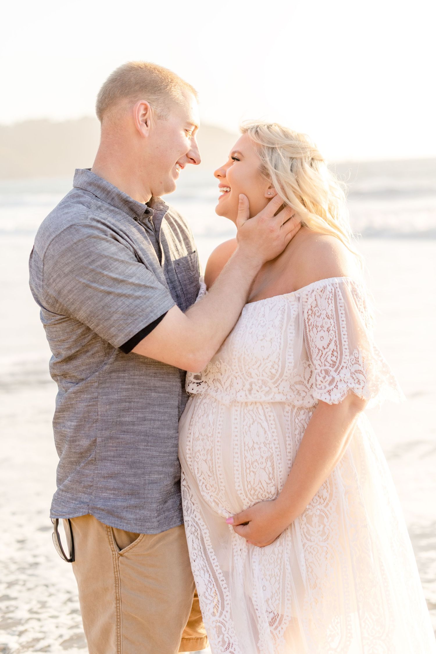 Intimate beach photography series capturing romantic close-up moments between a couple.
