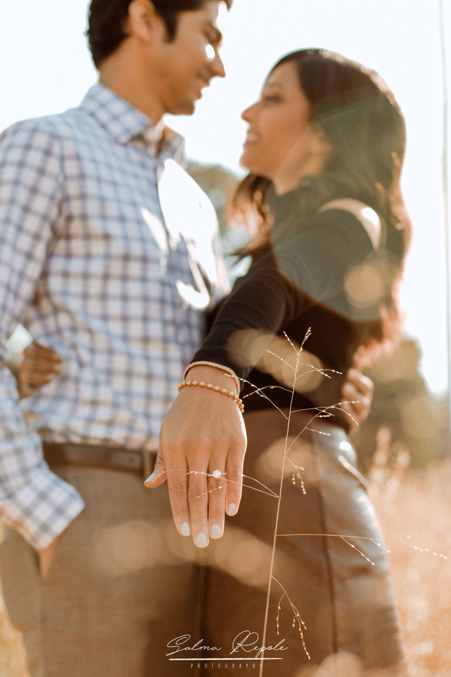 Romantic engagement photoshoot showing close-up details of a couple and ring during golden hour sunset.