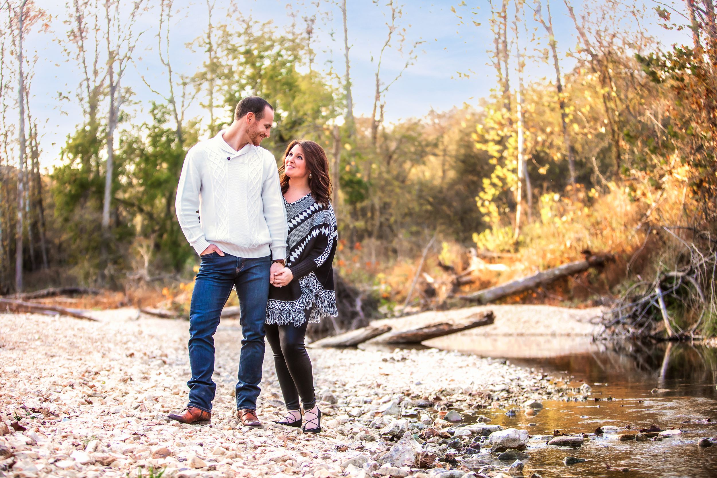 Engagement Session with man and woman looking at each other Busiek State Park