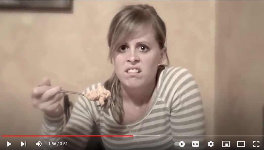Denae Smith makes a face at her husband's awful mustache