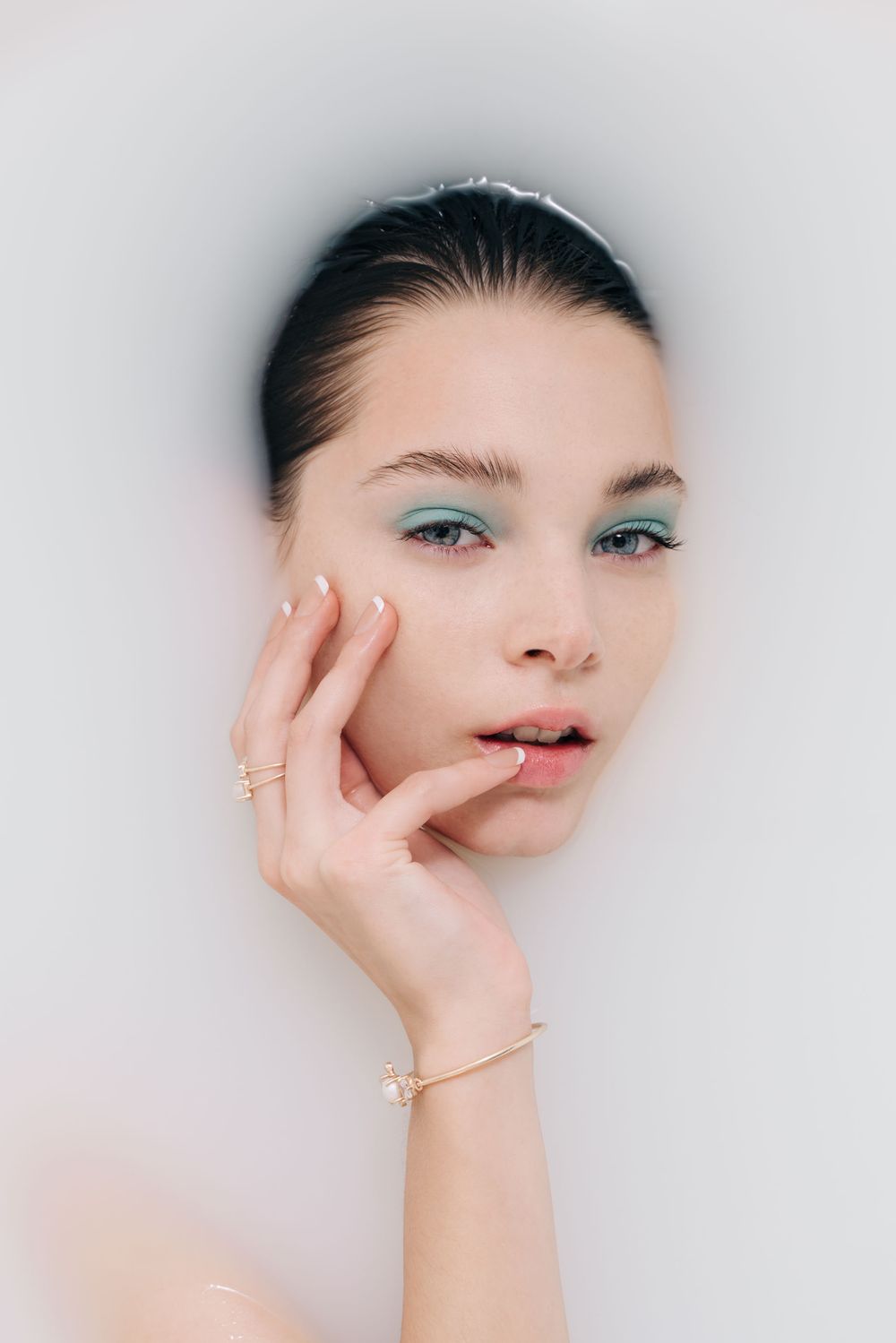 Face on water editorial shot by Bill Chen photography