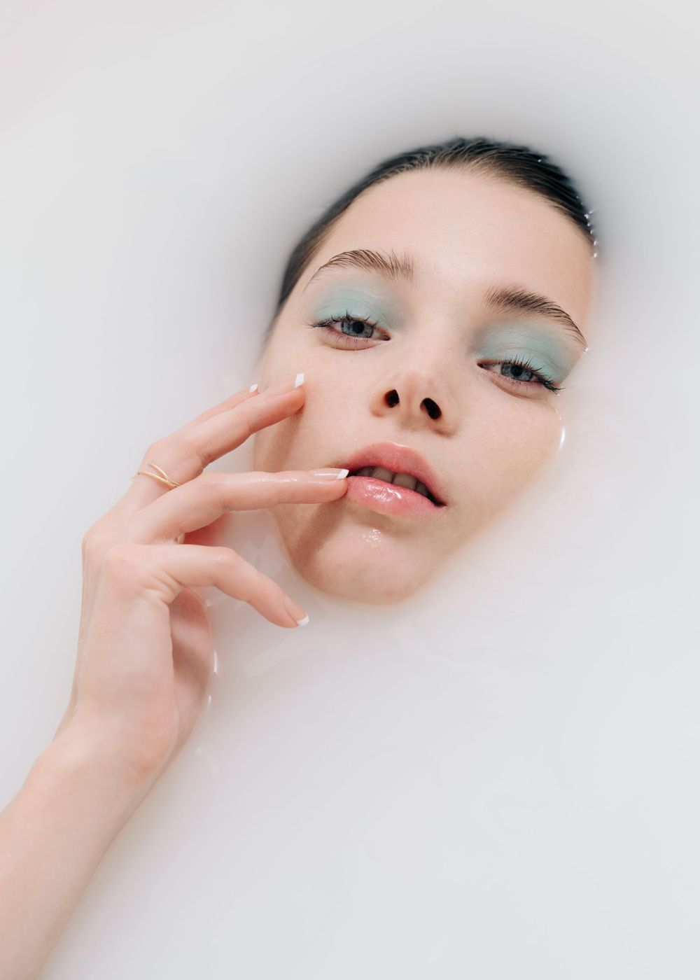 Face on water editorial shot by Bill Chen photography