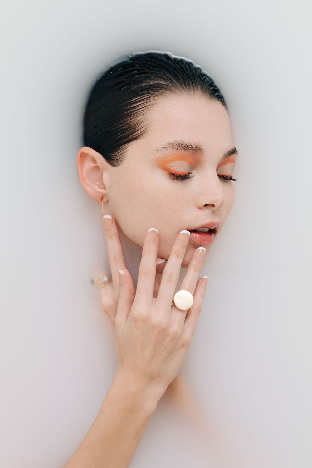 Face on water editorial shot by Bill Chen photography