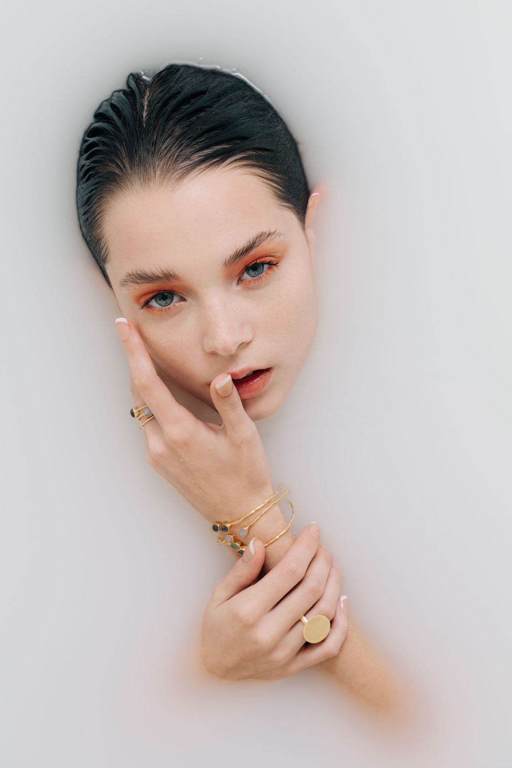 Face on water editorial shot by Bill Chen photography