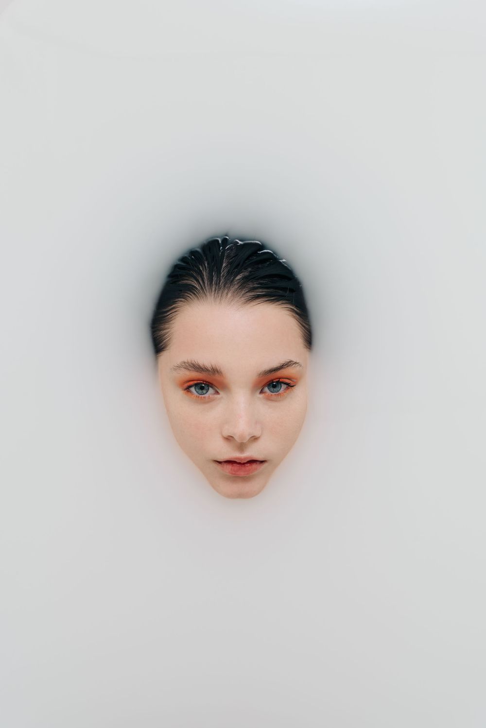 Face on water editorial shot by Bill Chen photography