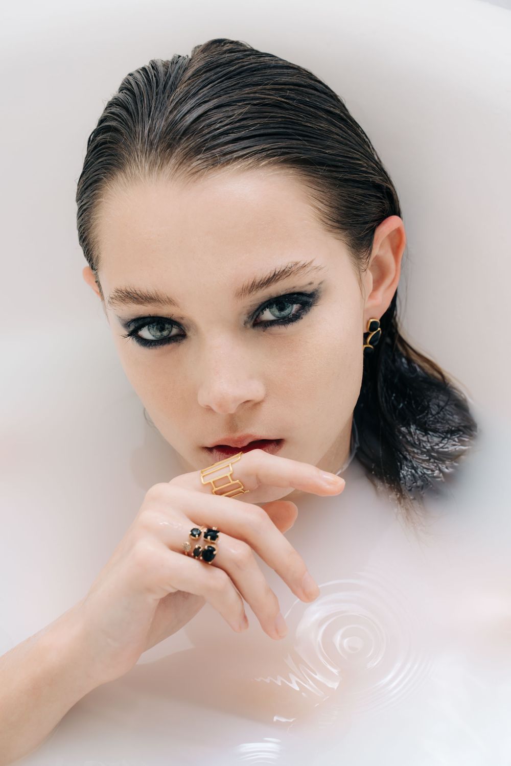 Face on water editorial shot by Bill Chen photography