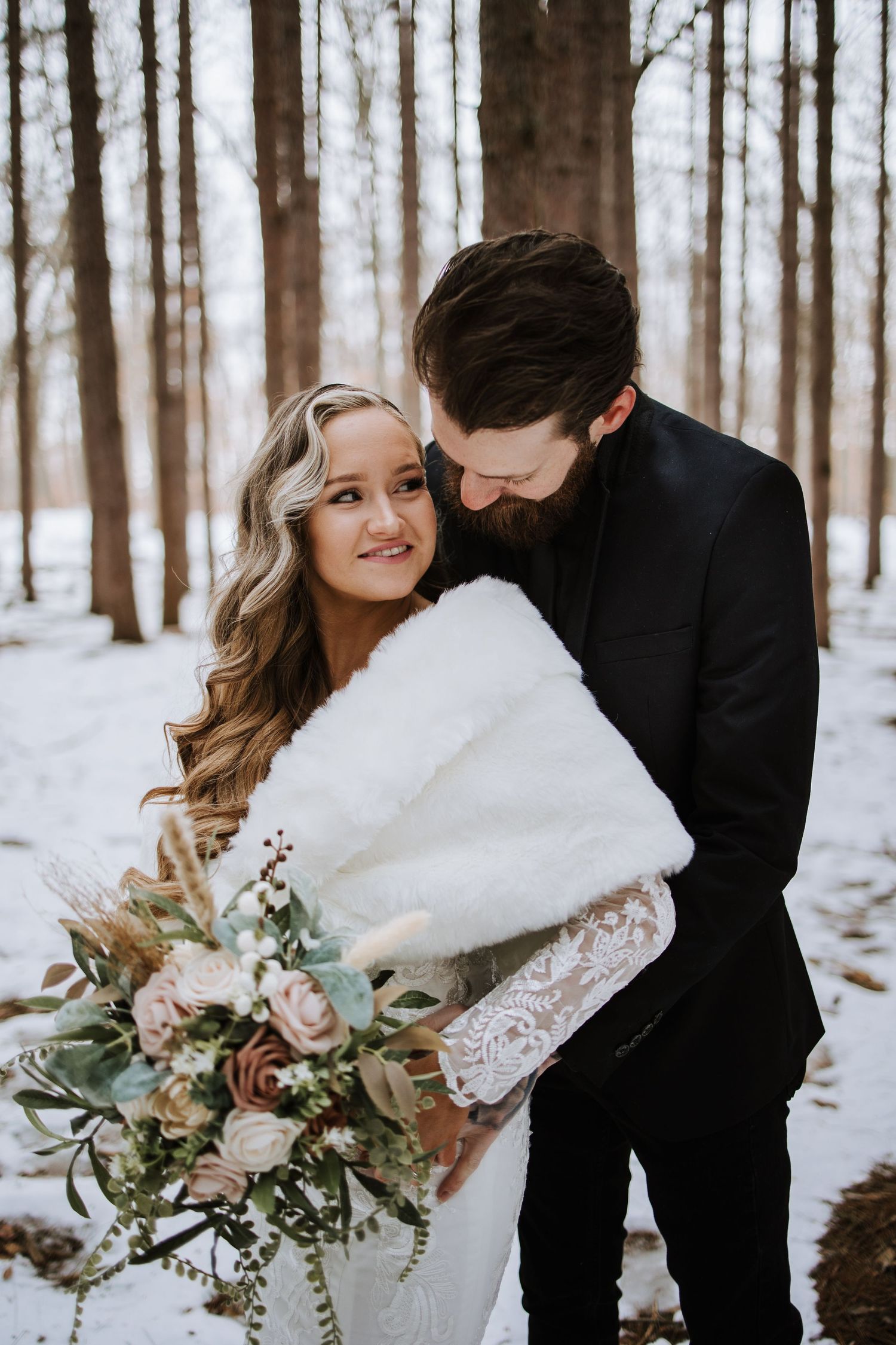 Oak Openings Elopement photos in the snow captured by photographer Autumn Case with DreamStudios LLC out of Toledo Ohio