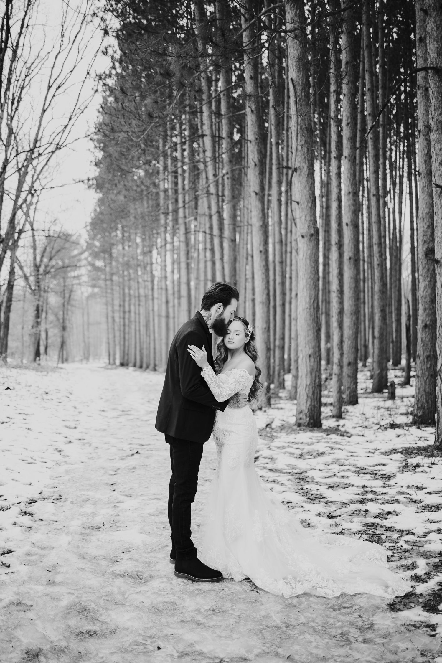 Oak Openings Elopement photos in the snow captured by photographer Autumn Case with DreamStudios LLC out of Toledo Ohio