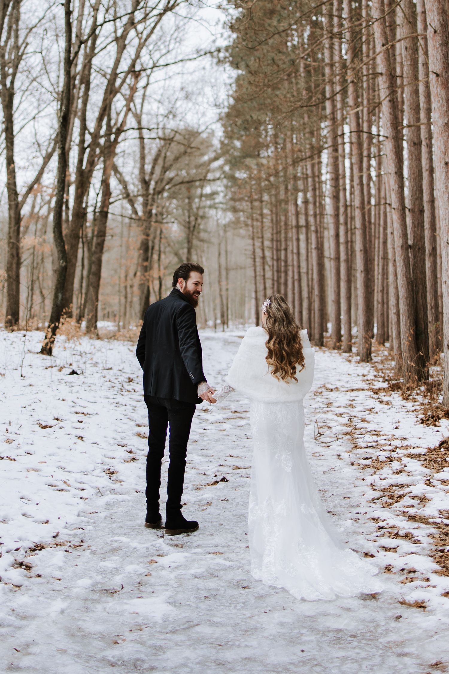 Oak Openings Elopement photos in the snow captured by photographer Autumn Case with DreamStudios LLC out of Toledo Ohio