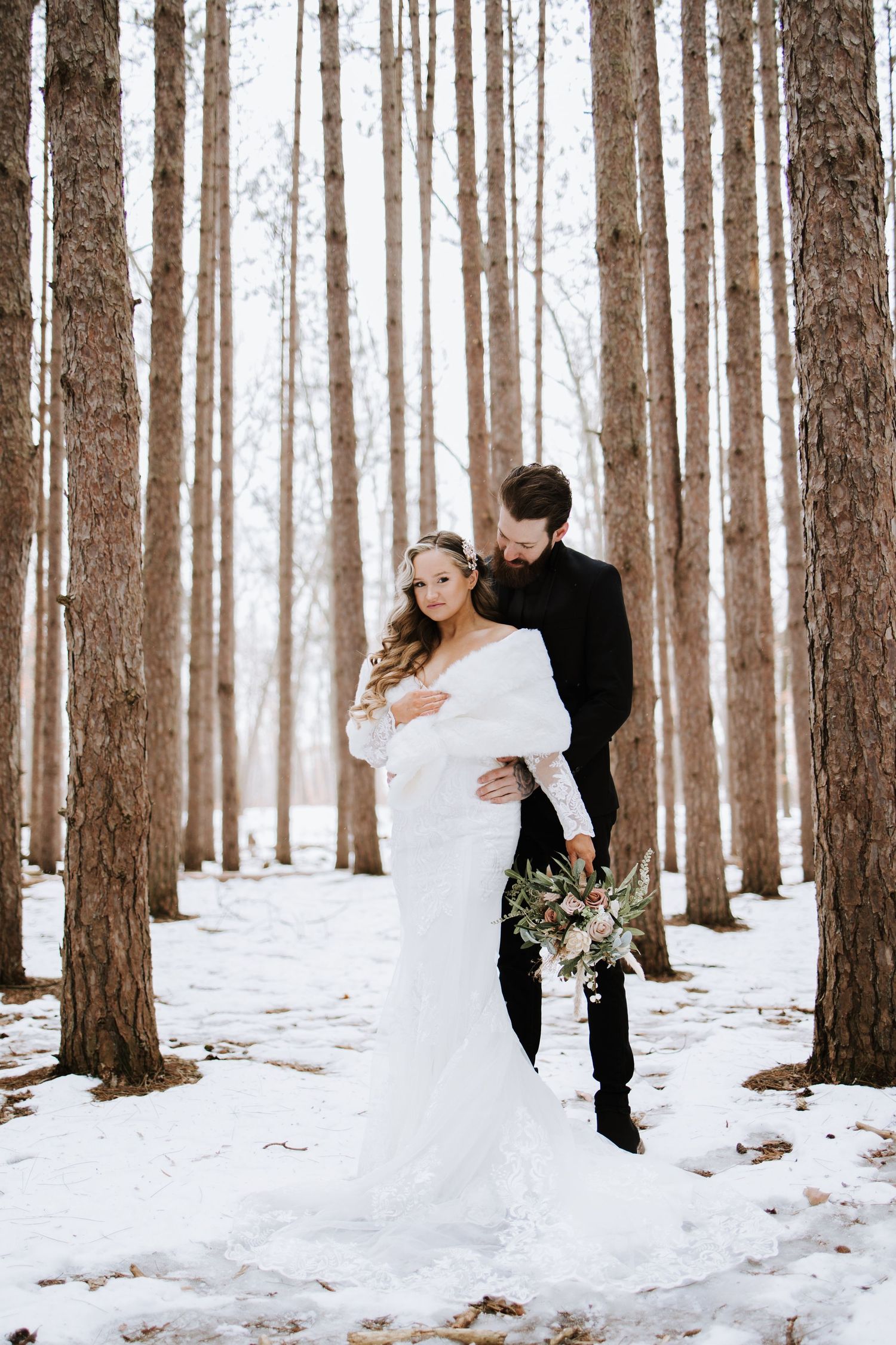 Oak Openings Elopement photos in the snow captured by photographer Autumn Case with DreamStudios LLC out of Toledo Ohio