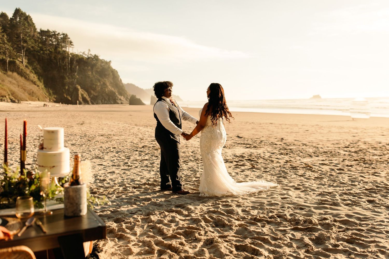 LGBTQ+ couple dancing on Oregon Coast for elopement