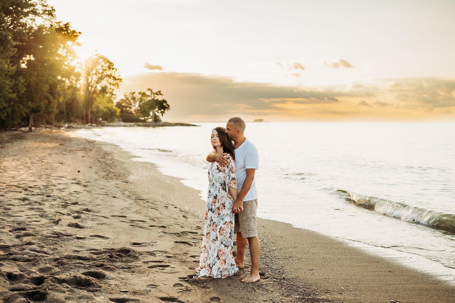 Couple on a beach in Huron Ohio Jessica Hepp Photography
