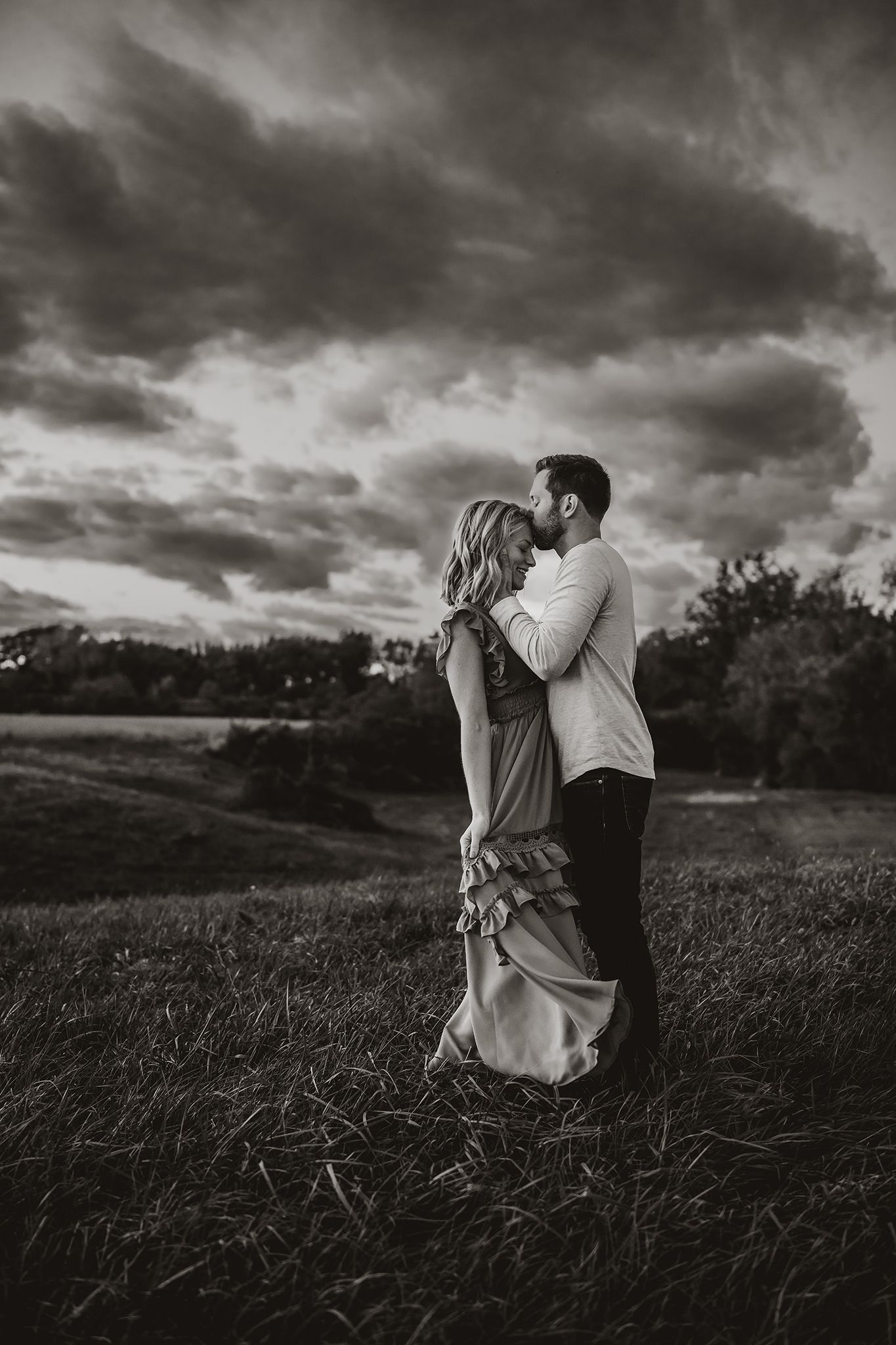 Couple in a pasture in Vermilion Ohio Jessica Hepp Photography