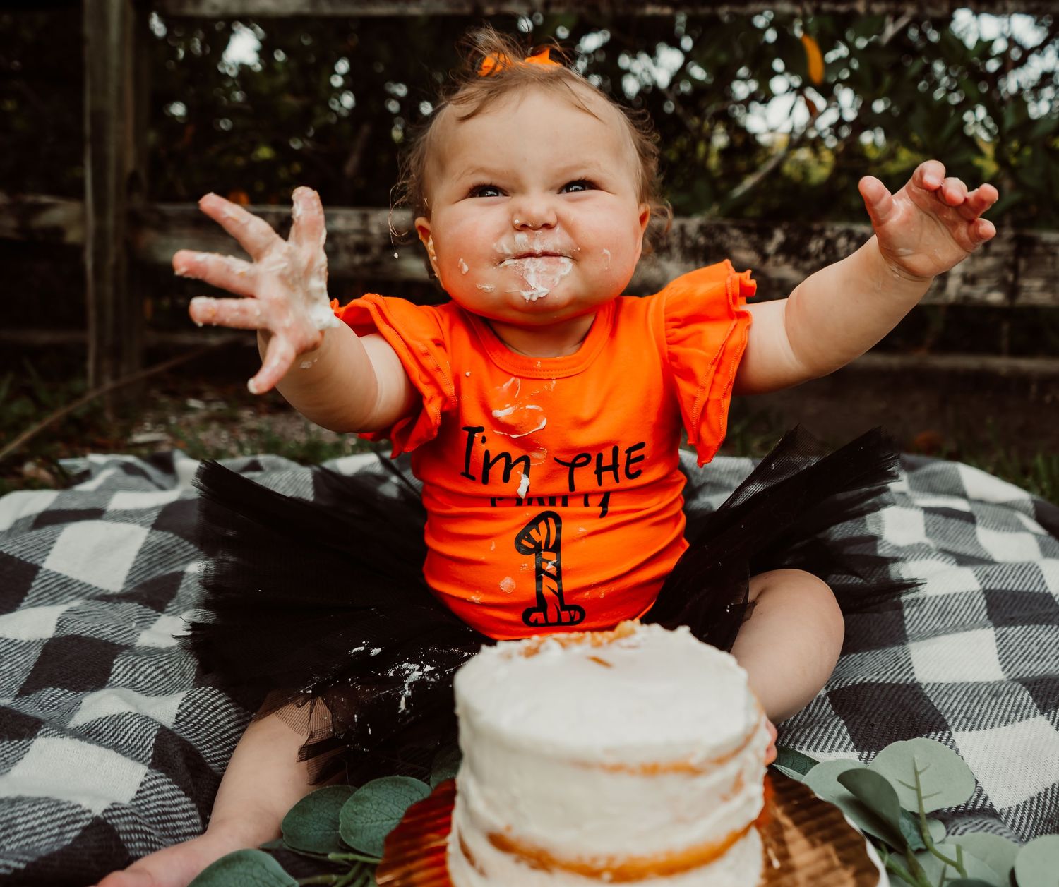 Outdoor Cake Smash Session at Indian Rocks Beach, Indian Rocks, FL; Baby giving big hugs for cake