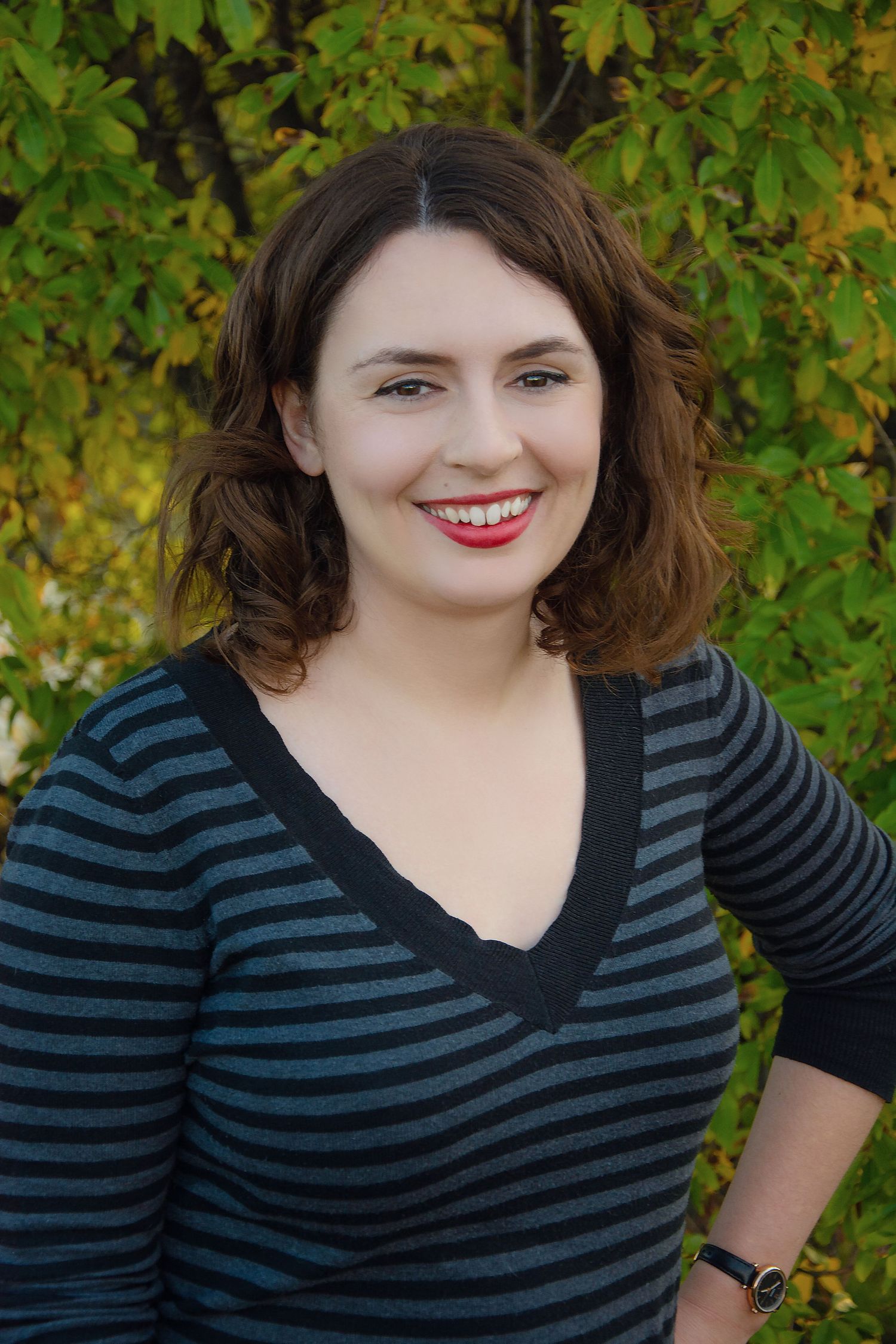 smiling woman with red lipstick and striped shirt, portrait photo, edmonton portrait, yeg  headshot, photographer