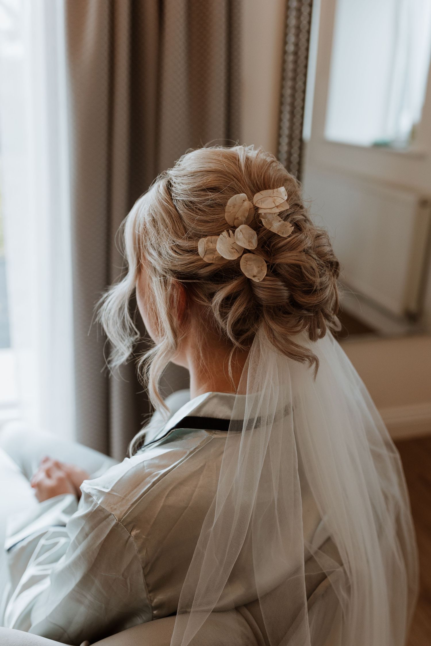 Dried Lunaria in bridal hair with Adorn by Ashley veil