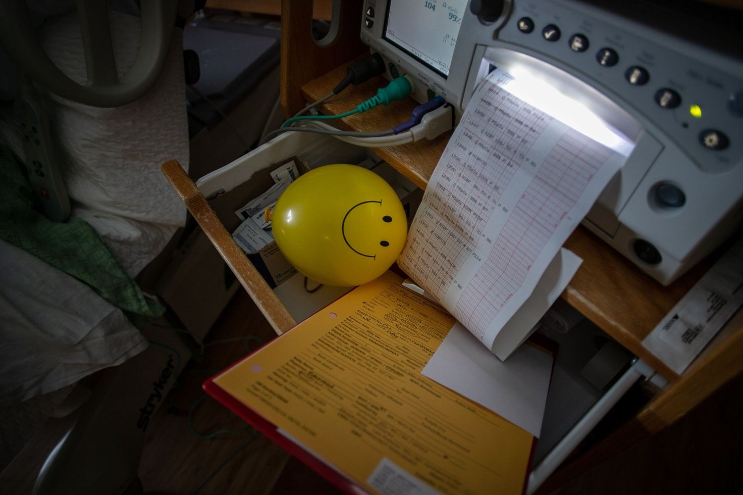 A smily faced yellow balloon in the drawer of the labor room patient monitoring system at UnityPoint Health St Lukes.