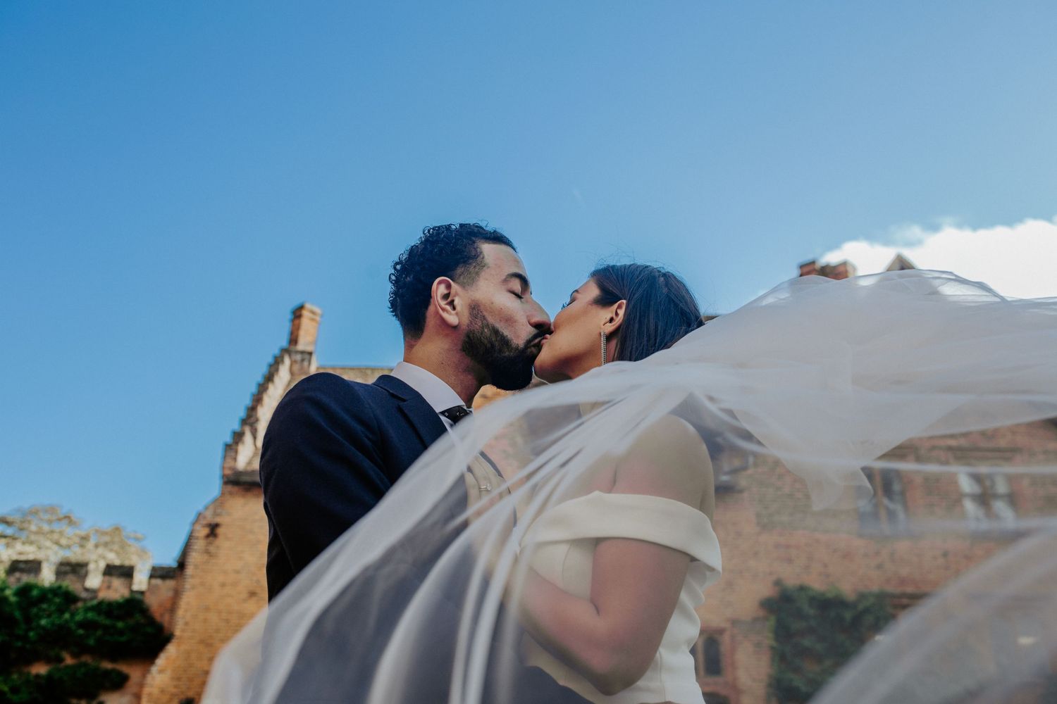 Bride and groom at their wedding at Hatfield House, Hertfordshire