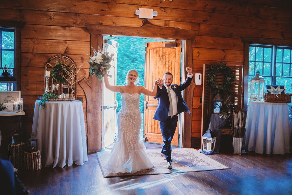 bride and groom enter reception