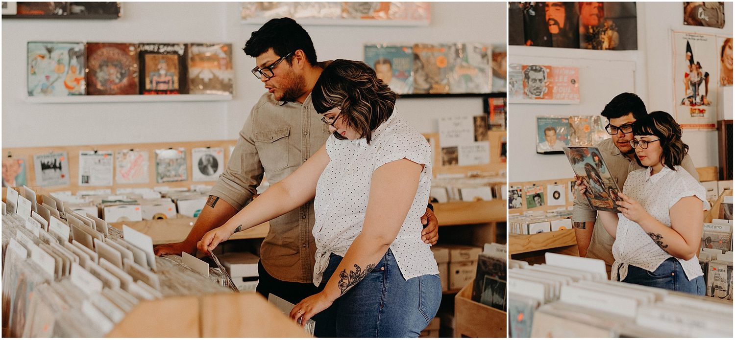 Two people flip through vinyl records at a record store while looking at albums.