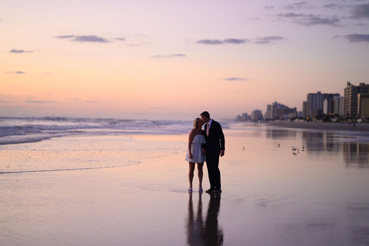 Bride and Groom standing silhouette.
