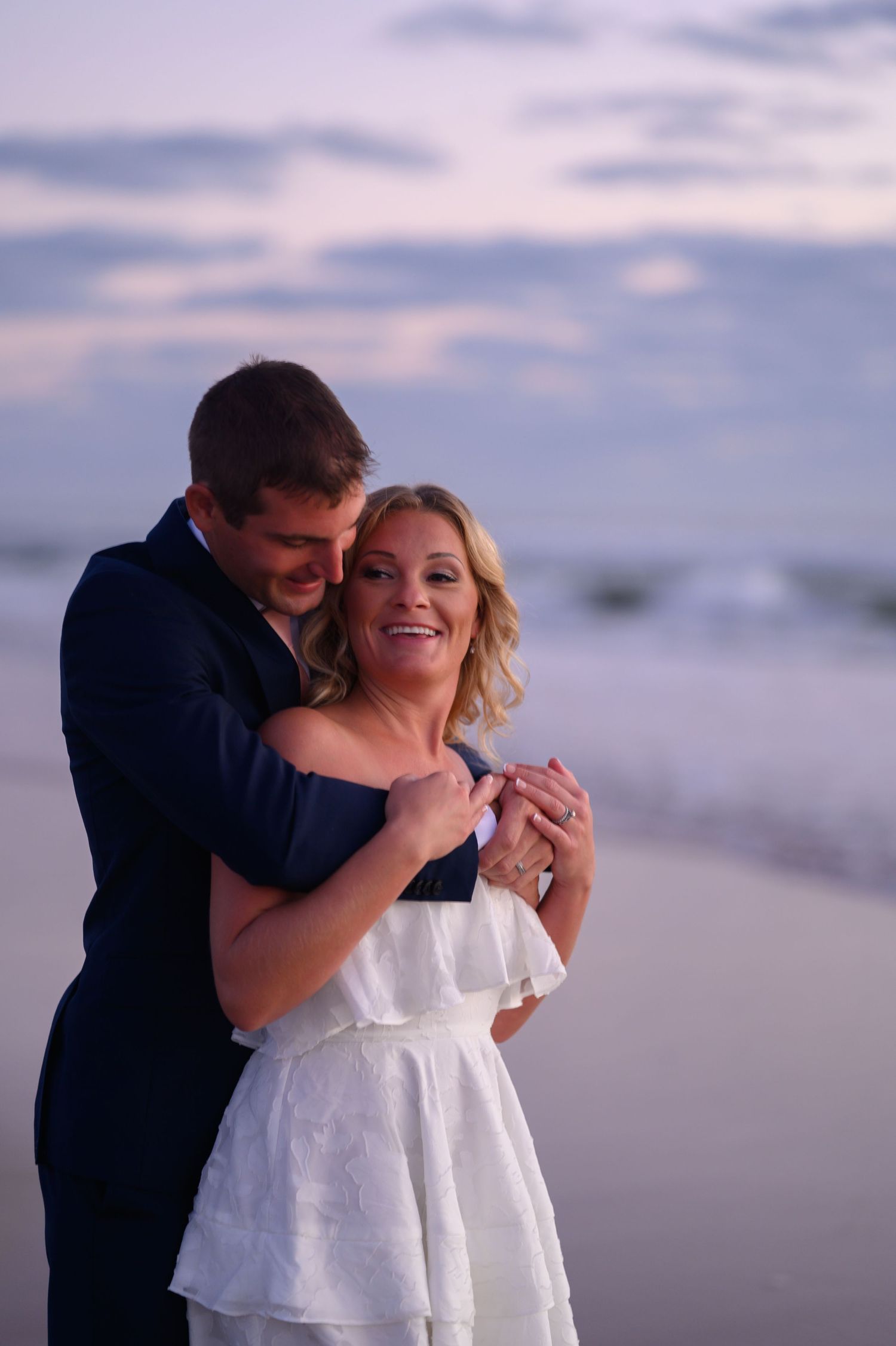 Bride and Groom hugging.