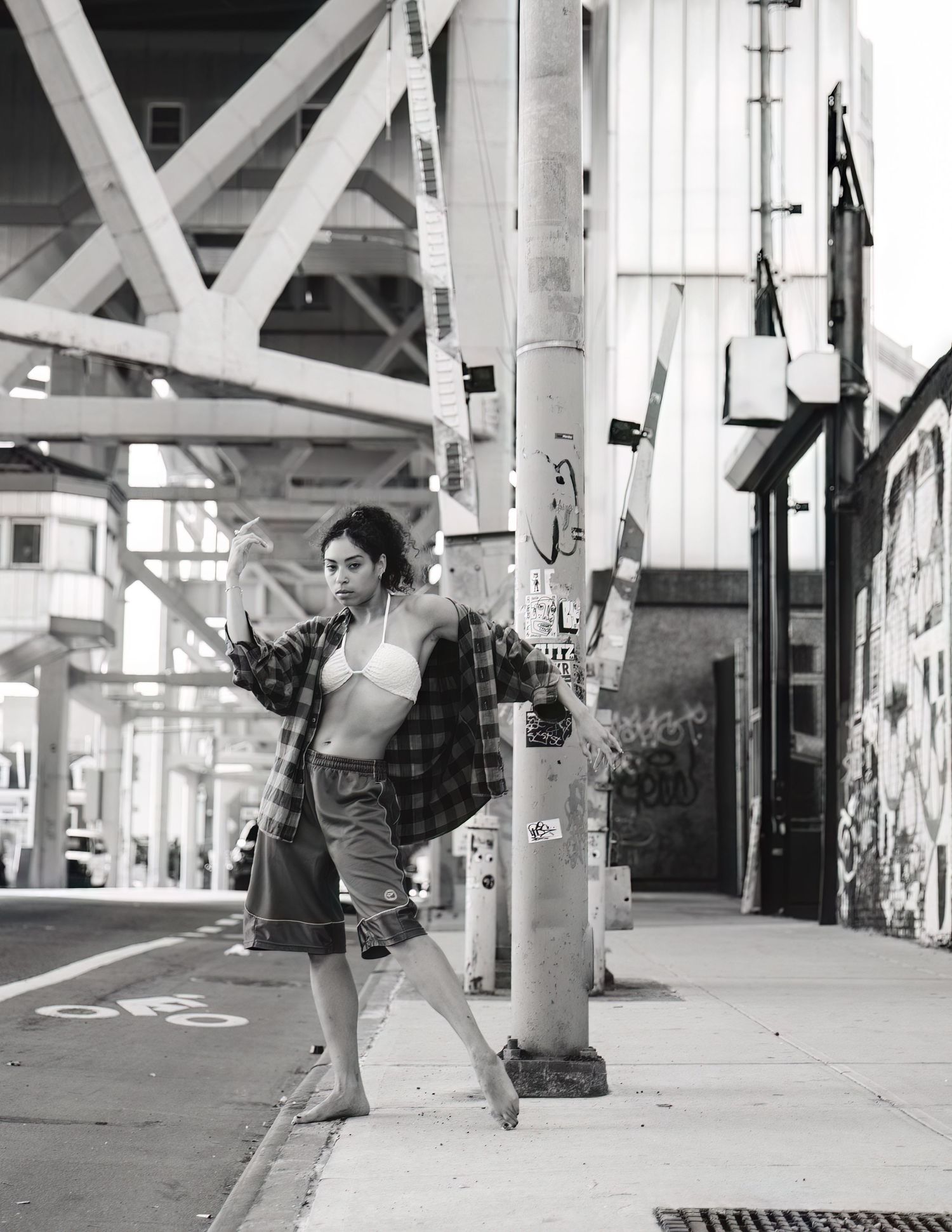 Dancer dancing in Brooklyn NY by graffiti